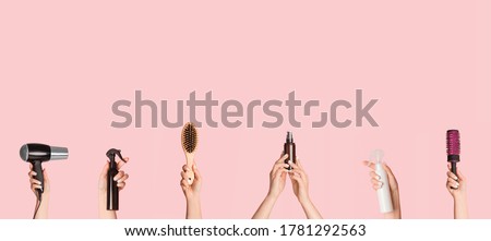Collage with female hands holding different hair care products and equipment over pink background, copy space. Panorama