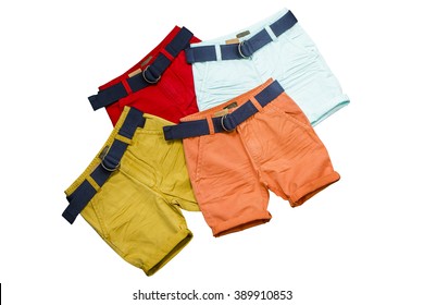 Collage Of Male Kid Clothing. Boy Colorful Shorts.