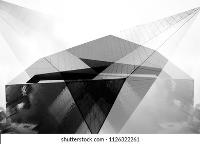 Collage of modern architecture fragments with angular structure. Abstract black and white architectural or industrial background with geometric shapes.