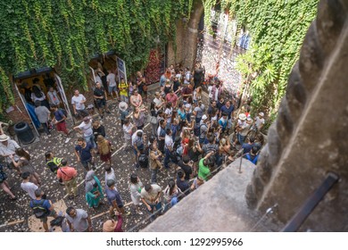 A Collage Of Photos Of A Bronze Statue Of Juliet And Group Of People Around It. Photo From Balcony. 12.8.2017, Italy Verona