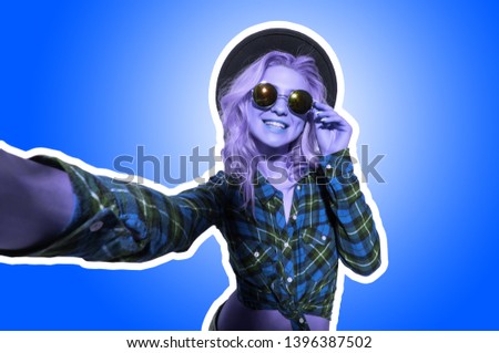 Collage portrait of pretty bonde woman in summer clothes sunglasses and blackhat taking a selfie isolated on blue background