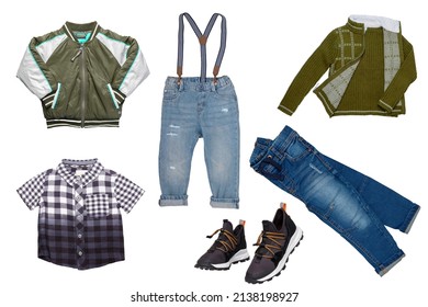 Collage set of little boys spring clothes isolated on a white background. Denim trousers or pants, a pair of shoes, a rain jacket, shirts and jumpers for child boy. Children's autumn and winter fashio