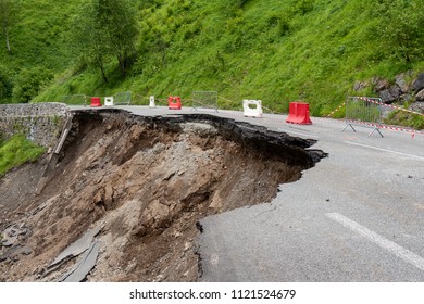 a collapse of the road in the French Pyrenees - Shutterstock ID 1121524679