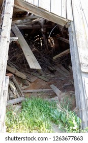 Collapsed Abandoned Building In The Middle Of Nowhere In A Field, Doorway