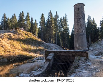 Collapsed Dam Intake Tower In The Forest