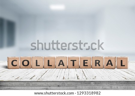 Collateral sign message on a worn desk in a bright office