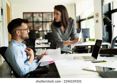 Colleagues arguing in office. Angry businesswoman yelling at her collegue	 - Shutterstock ID 2196159101