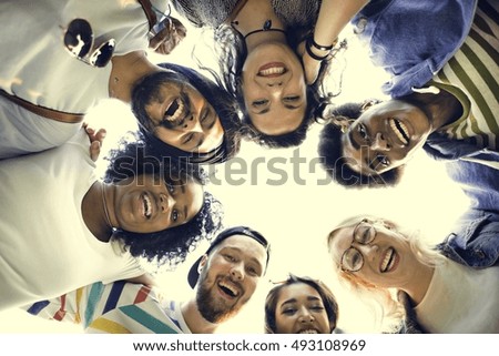 Similar – Young happy people with their heads together having fun in summer party