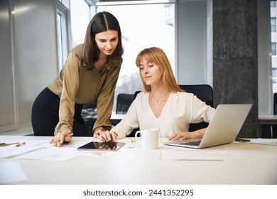 Colleagues in corporate office discussing designing strategies - Powered by Shutterstock