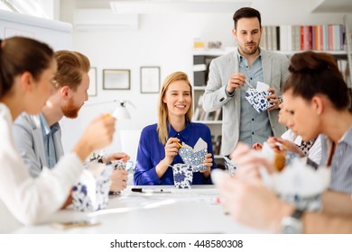 Colleagues Eating In Office During Lunch Break