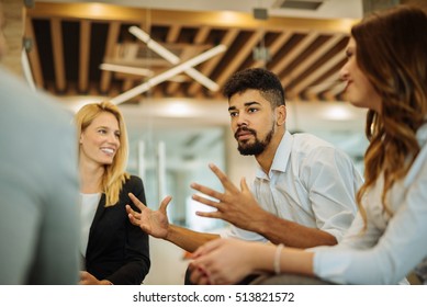 Colleagues Having A Meeting In A Conference Room.