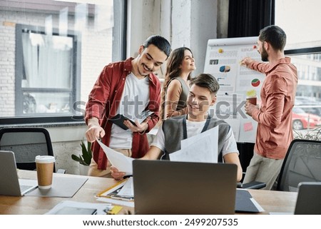 Colleagues interact casually while at workplace.