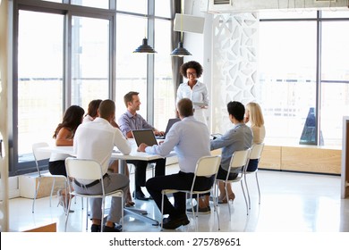 Colleagues at an office meeting