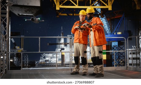 Colleagues using drone to collect data for offshore platform evaluation, inspection and environmental monitoring to enhance safety and efficiency in petroleum extraction.
