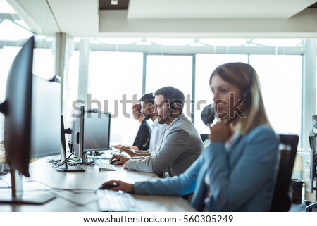 Colleagues working in a call center.