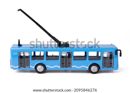 Collectible model of a blue trolleybus on a white background. Children's toy. Passenger transport