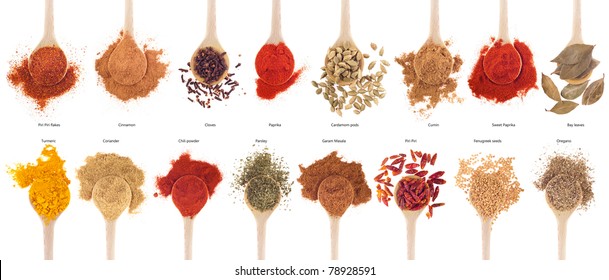 collection of 16 spices on wooden spoons (cumin, coriander, cloves, curry, chili, piri piri, cinnamon, cardamom, fenugreek,  garam masala, oregano, parsley, paprika, turmeric, bay) isolated on white - Powered by Shutterstock