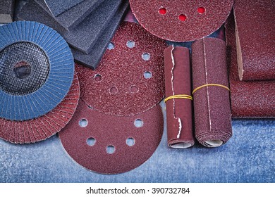 Collection Of Abrasive Materials On Metallic Background Close Up View.