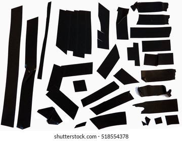 Collection of black adhesive electrical tape pieces.