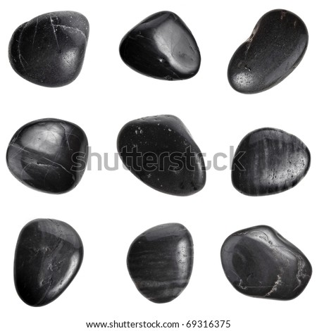 Collection of black SPA stones close up macro set isolated on white background