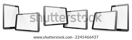 Collection of black tablet computers, isolated on white background