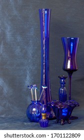 Collection of Blue Glass Vases and Lamp