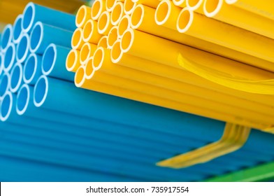 Collection of Blue and Yellow  plastic pipes