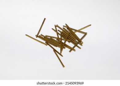 A collection of brass wood nail tacks