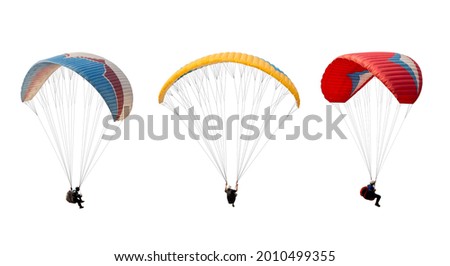 collection Bright colorful parachute isolated on white background,  The sportsman flying on a paraglider. Concept of extreme sport, taking adventure challenge.