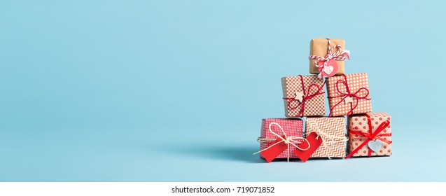 Collection Of Christmas Present Boxes On A Light Blue Background