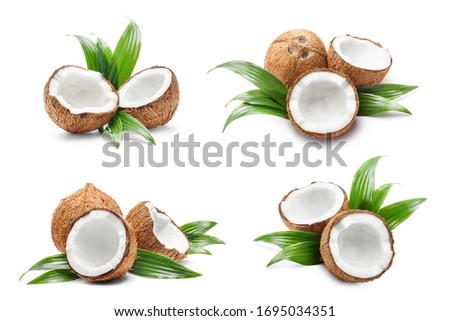 Collection of coconuts with leaves, isolated on white background