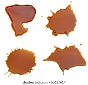 collection of coffee stains on white background. each one is shot separately