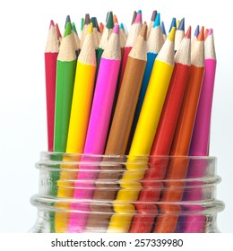 Collection Of Colored Pencils In A Jar.