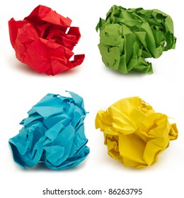 collection of colorful crumpled papers over white background