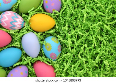 Collection Of Colorful Easter Eggs On Easter Grass Background