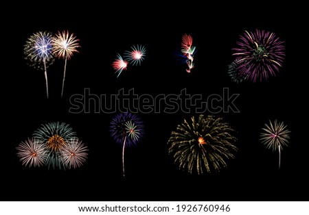 Collection of colorful festive eight fireworks exploding over night sky, isolated on black background