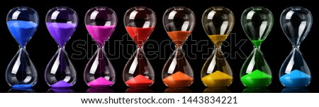 Collection of colorful hourglasses showing the passage of time