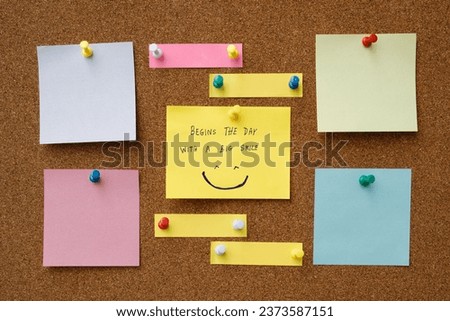 collection of colorful variety post note. paper note reminder sticky notes pin paper blue  on cork bulletin board. empty space for text.