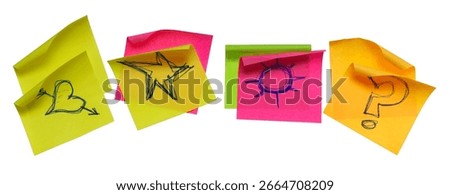 Collection of different colored sheets of note papers, curled corner with drawn symbols, isolated on white background, clipping path