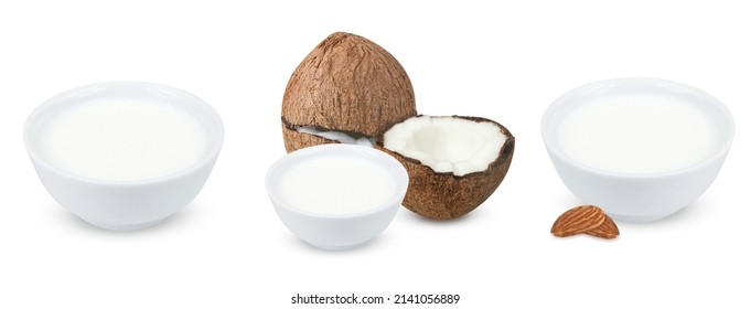 Collection of different milk on isolated white background. Coconut milk, almond milk and cow's milk.