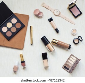 Collection Of Different Professional Make Up Products On Textile Background Top View. Make Up Set Studio Shot.Woman Fashion Accessories. Autumn Nude Brown And Beige Mood