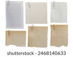 A collection of different types of vintage paper, some lined, with paperclips attached, isolated on a white background.