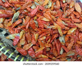 A Collection Of Dried Orange Chilies That Have Withered. Content Contains Chrominance Noise, Luminance Noise, Sharpening Noise