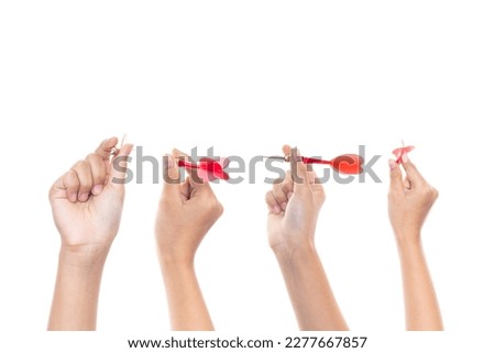 Collection of female hand holding a darts isolated on white background with clipping path.