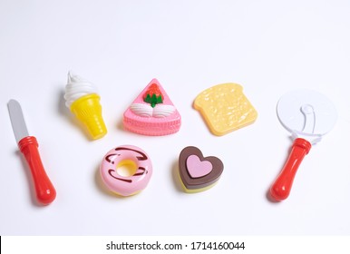 Collection Of Food Toys For Kids. Ice Cream, Slice Of Cake, Donuts. Flay Lay Image. White Background