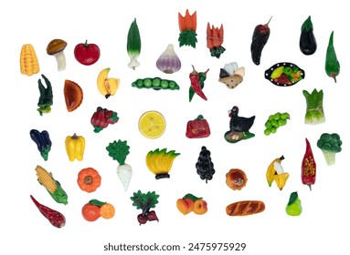 A collection of fruit and vegetable fridge magnets in different shapes and sizes - Powered by Shutterstock