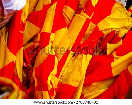 A collection of furled flags