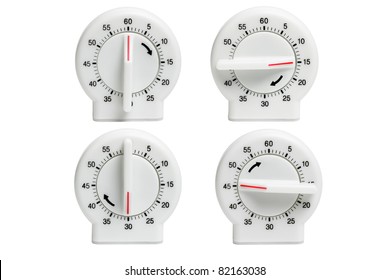 Collection of Kitchen timers showing dial setting at different times on white background