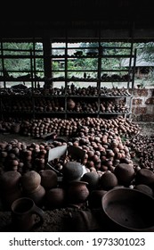 Collection of large quantity clay pots and jars in the workshop.