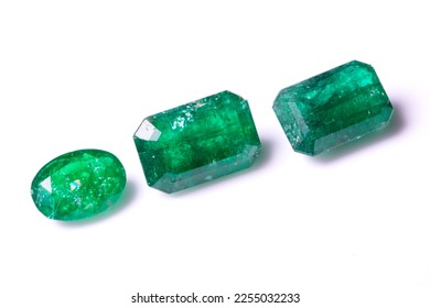 A collection of loose Emerald gemstones. Single stones for jewellery. Isolated on a white background - Shutterstock ID 2255032233